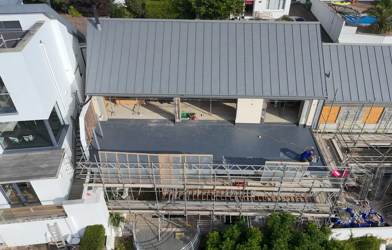 Zinc Standing-Seam Roof - flat roofing project by Amber Roofs in Jersey