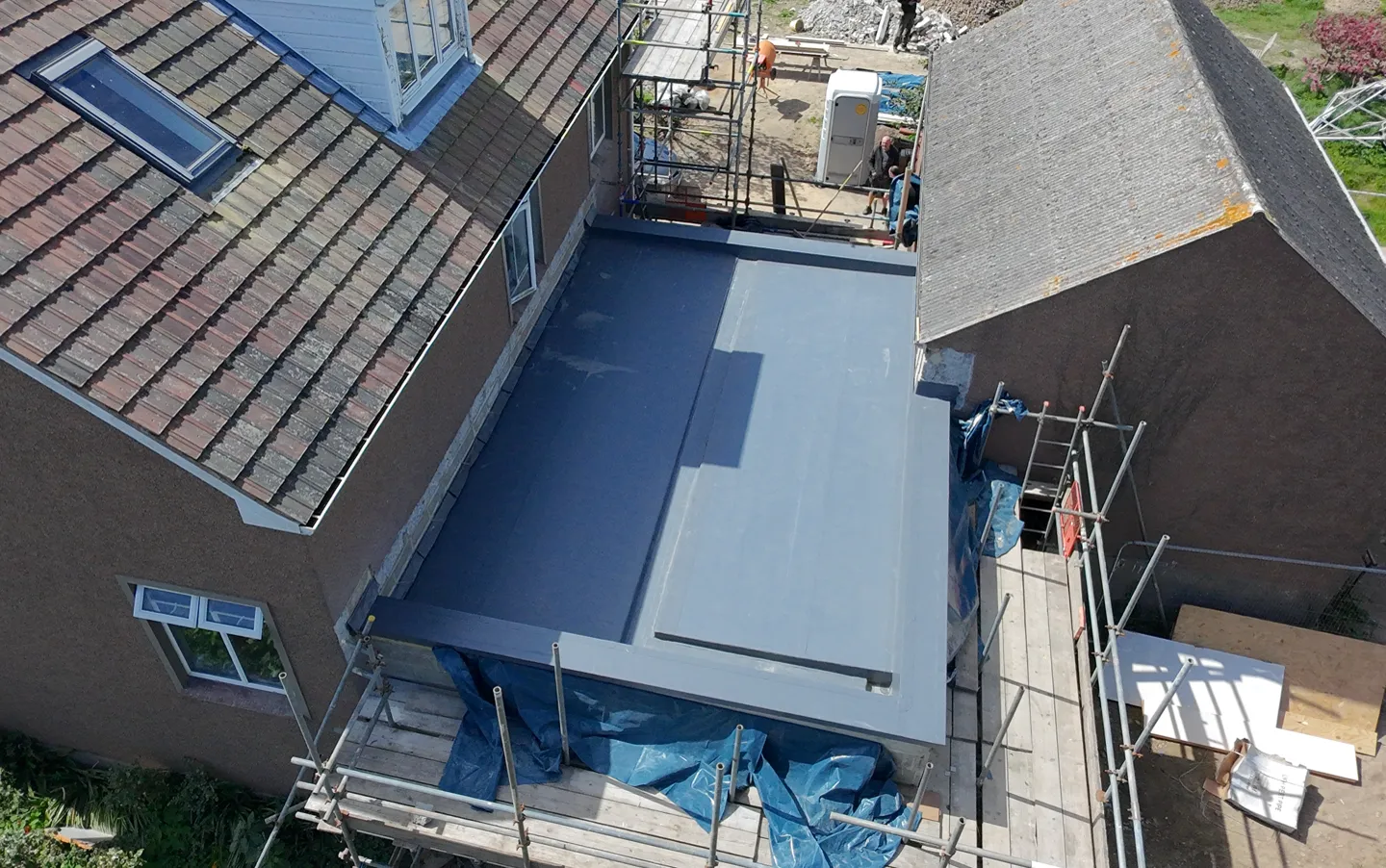 Long-Span Terrace Refurb - flat roofing project by Amber Roofs in Jersey