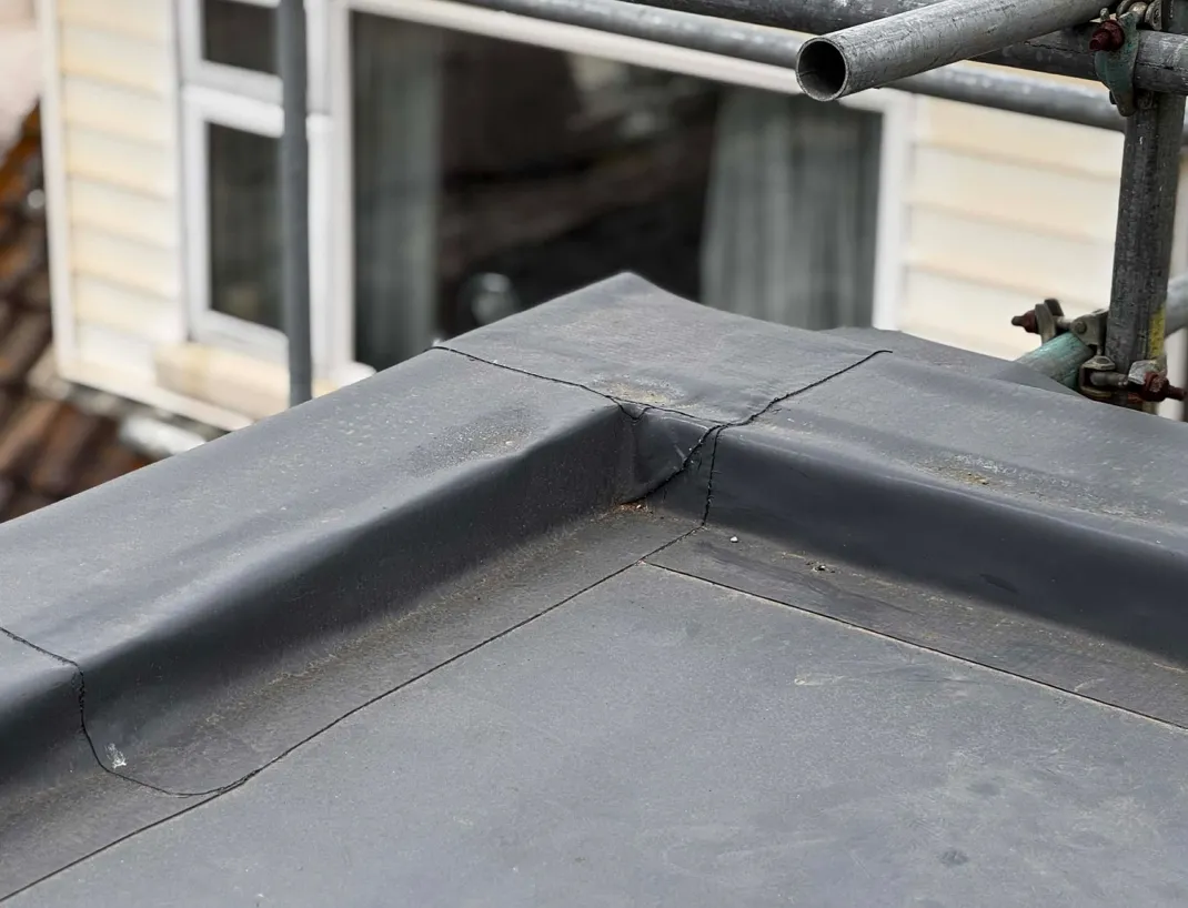 EPDM Ridge & Corner Detail - flat roofing project by Amber Roofs in Jersey