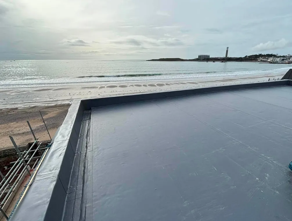 Beachfront Roof & Parapet - flat roofing project by Amber Roofs in Jersey