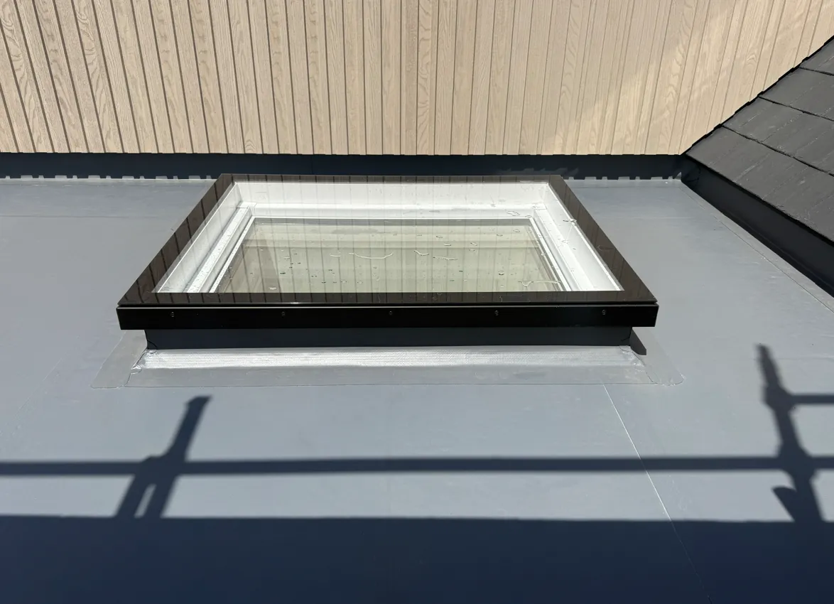 Parapet Outlet Detail - flat roofing project by Amber Roofs in Jersey